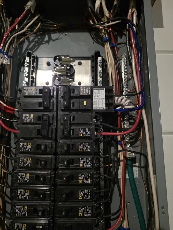 Close-up of breakers and wiring inside a residential panel in Seminole, FL