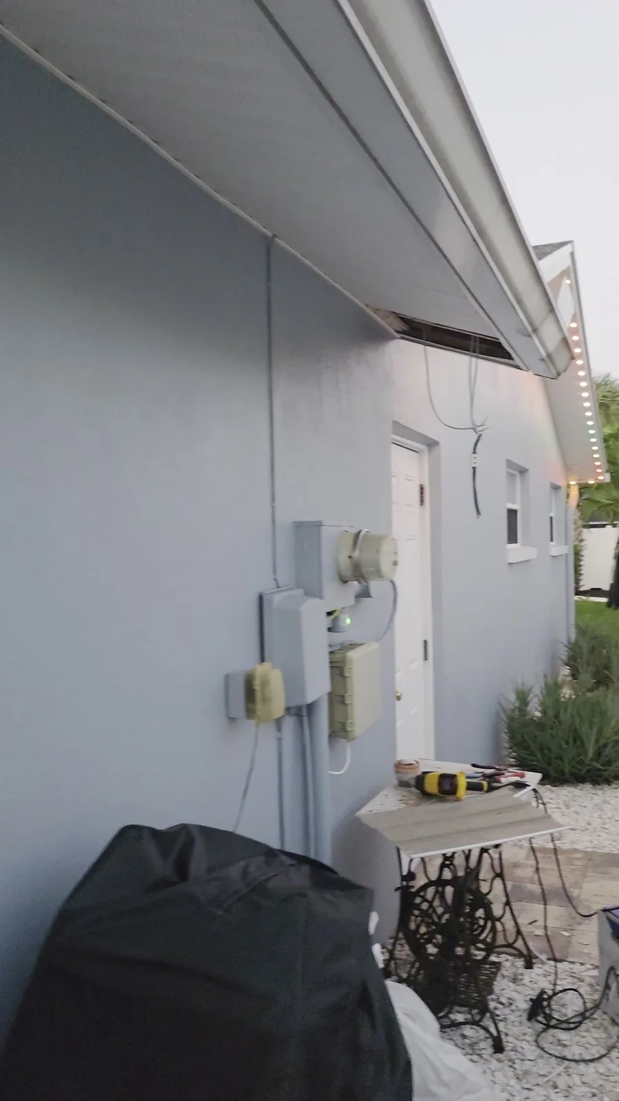 Booking Permanent Christmas Lights in Seminole: How Scheduling and Install Day Work JellyFish controller mounted next to the electric meter during a permanent lighting install