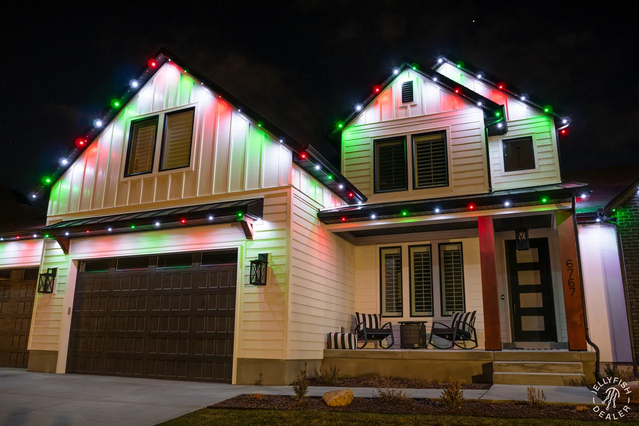 Christmas JellyFish permanent roofline lights on a cottage-style home in Indian Rocks Beach, FL