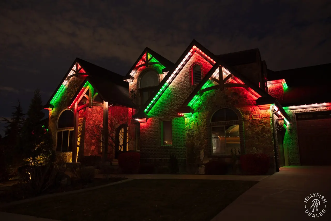 Permanent Christmas Lights in Belleair Bluffs, FL Home lit in a red and green JellyFish permanent Christmas scene