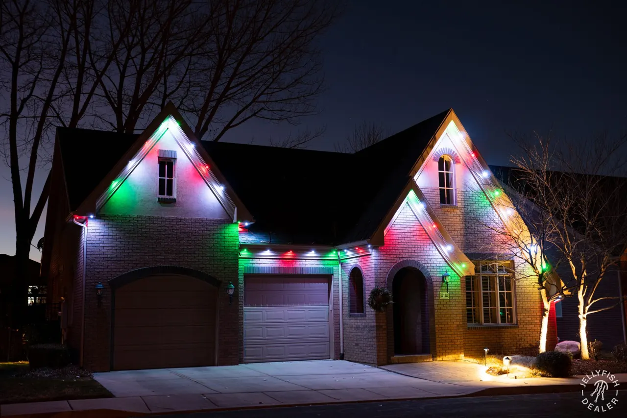 Permanent Christmas Lights in Belleair Bluffs, FL Steep gables with red and green JellyFish permanent Christmas lights