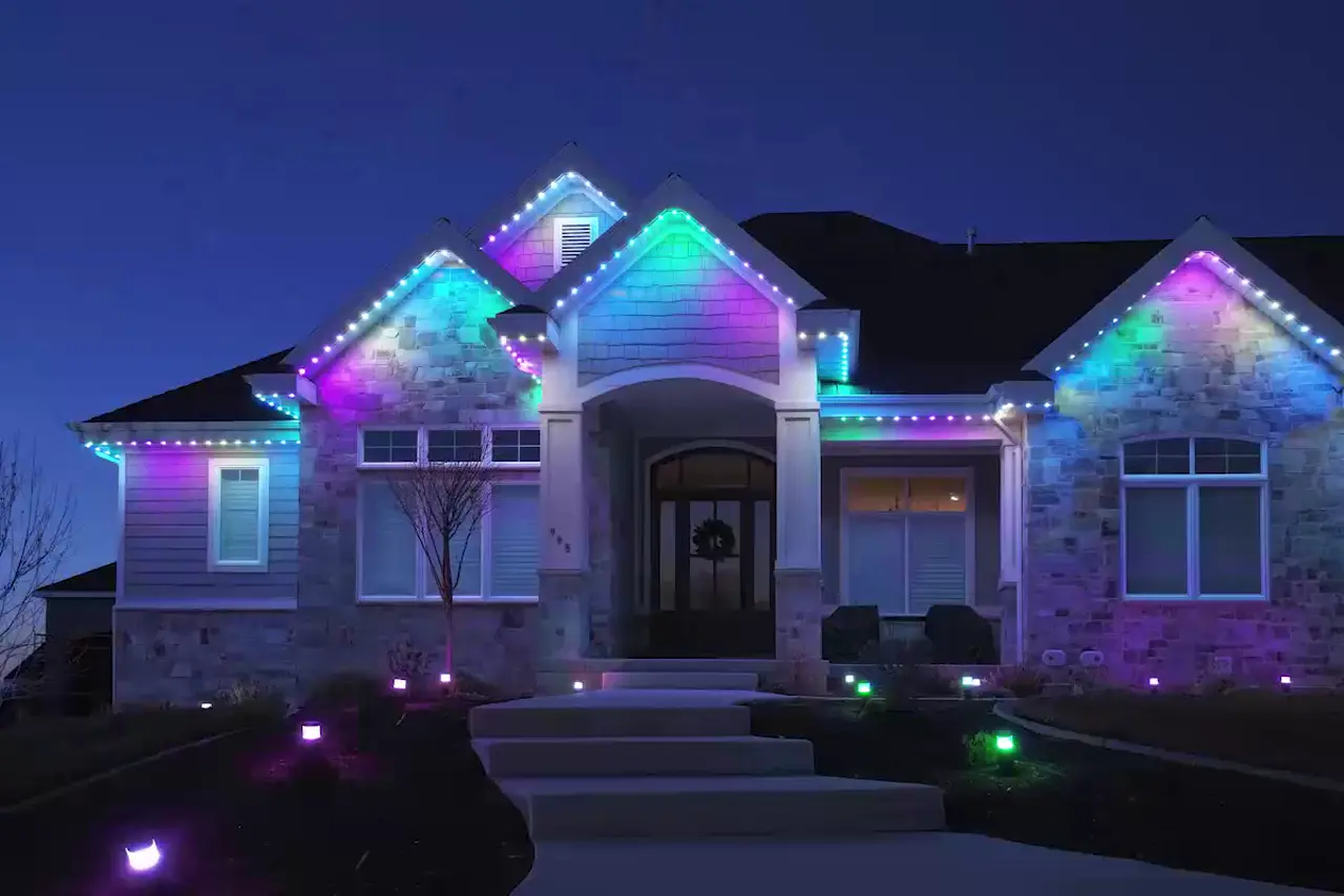 Free JellyFish Lighting Design Preview of Your Home Example rendering: a home by day and the same home lit at night with JellyFish permanent lights