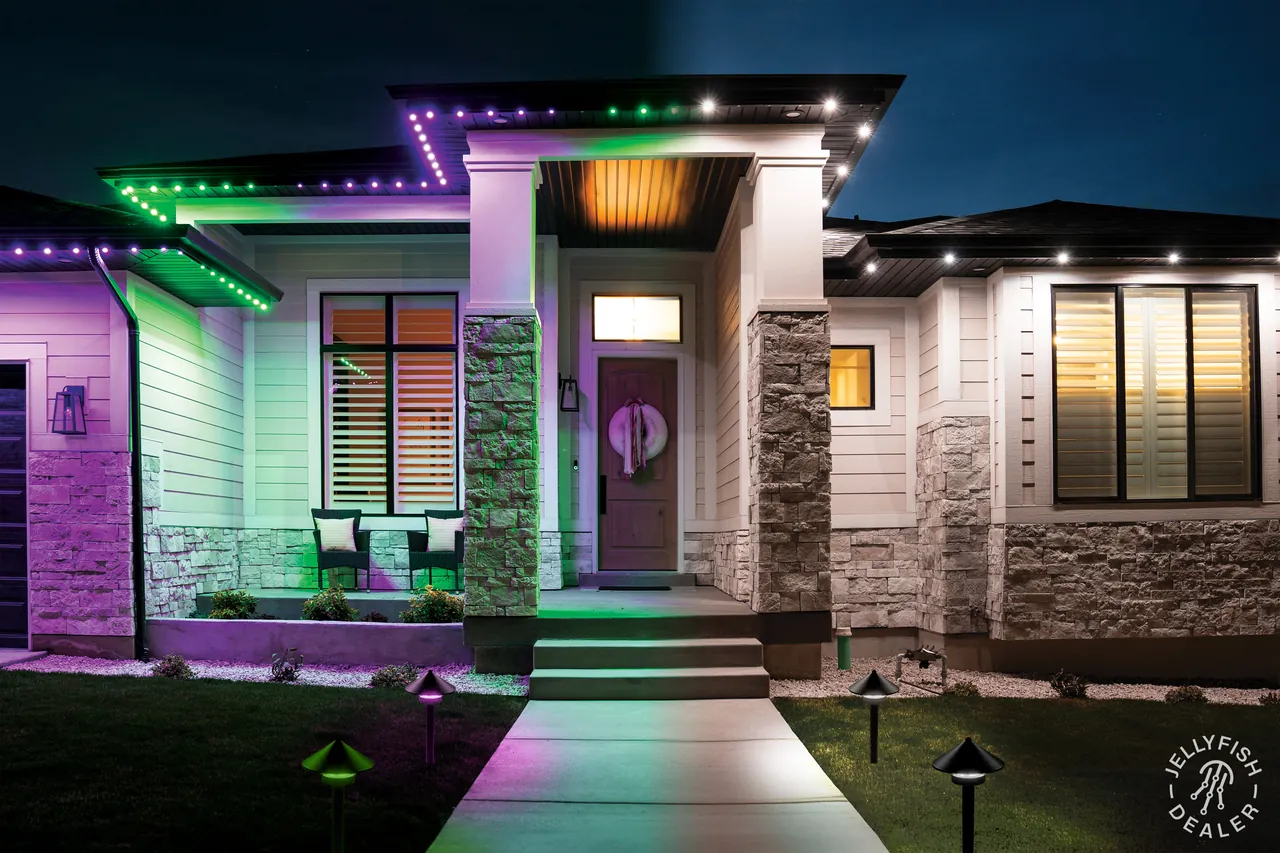 Holiday-colored JellyFish permanent roofline lights on a Safety Harbor, FL home