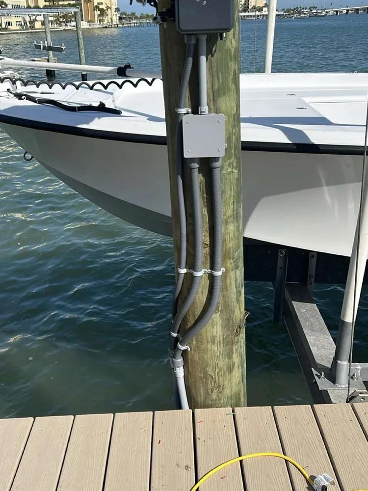 After: new boxes with the conduit runs neatly strapped, installed by Keywest Lights & Electric in nearby St. Petersburg