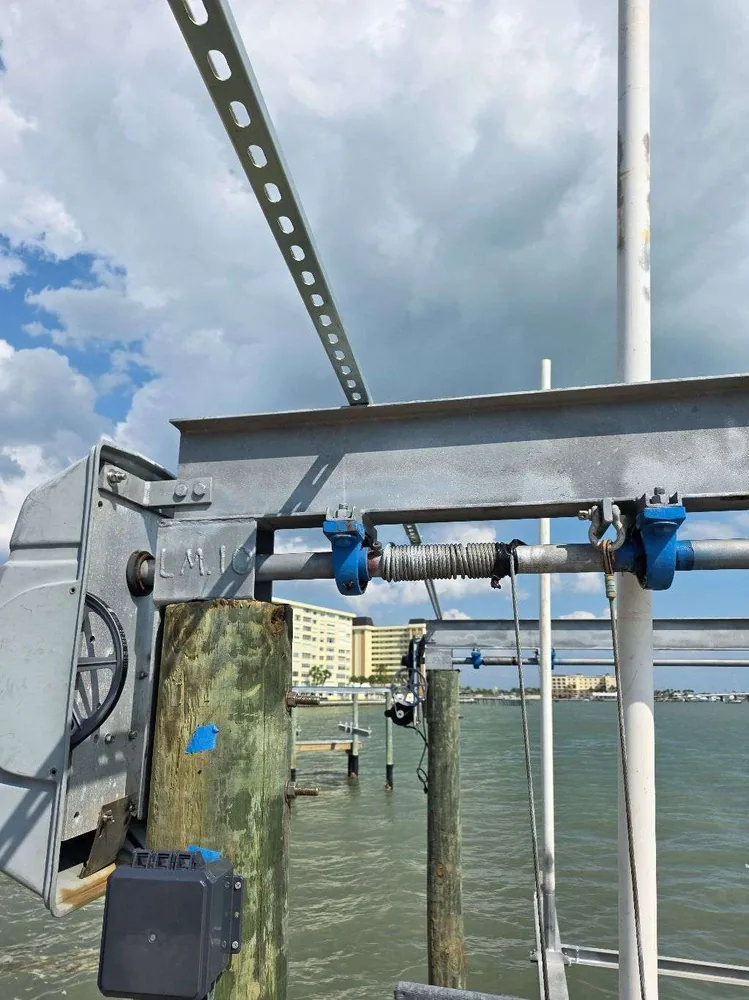 Boat Dock Panel & Dock Electric – St. Petersburg FL Dock and boat-lift electrical in St. Petersburg, FL – boat-lift wiring at the top of the piling after the work