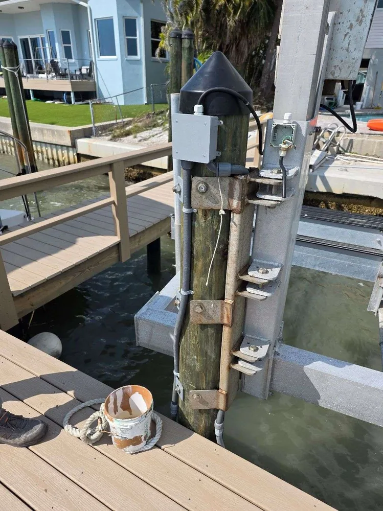 Dock and boat-lift electrical in St. Petersburg, FL – before boat-lift wiring with an open box