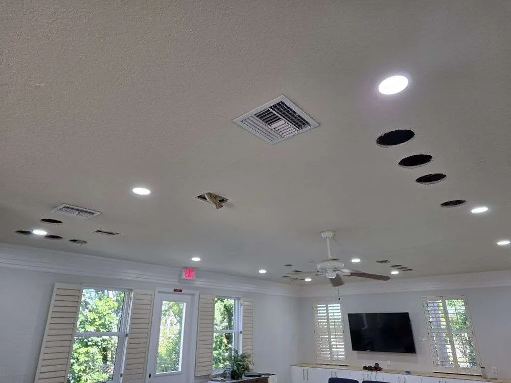 Commercial Lighting Remodel – St. Petersburg FL Commercial lighting remodel in St. Petersburg, FL – during: new recessed lights going in across the common-room ceiling