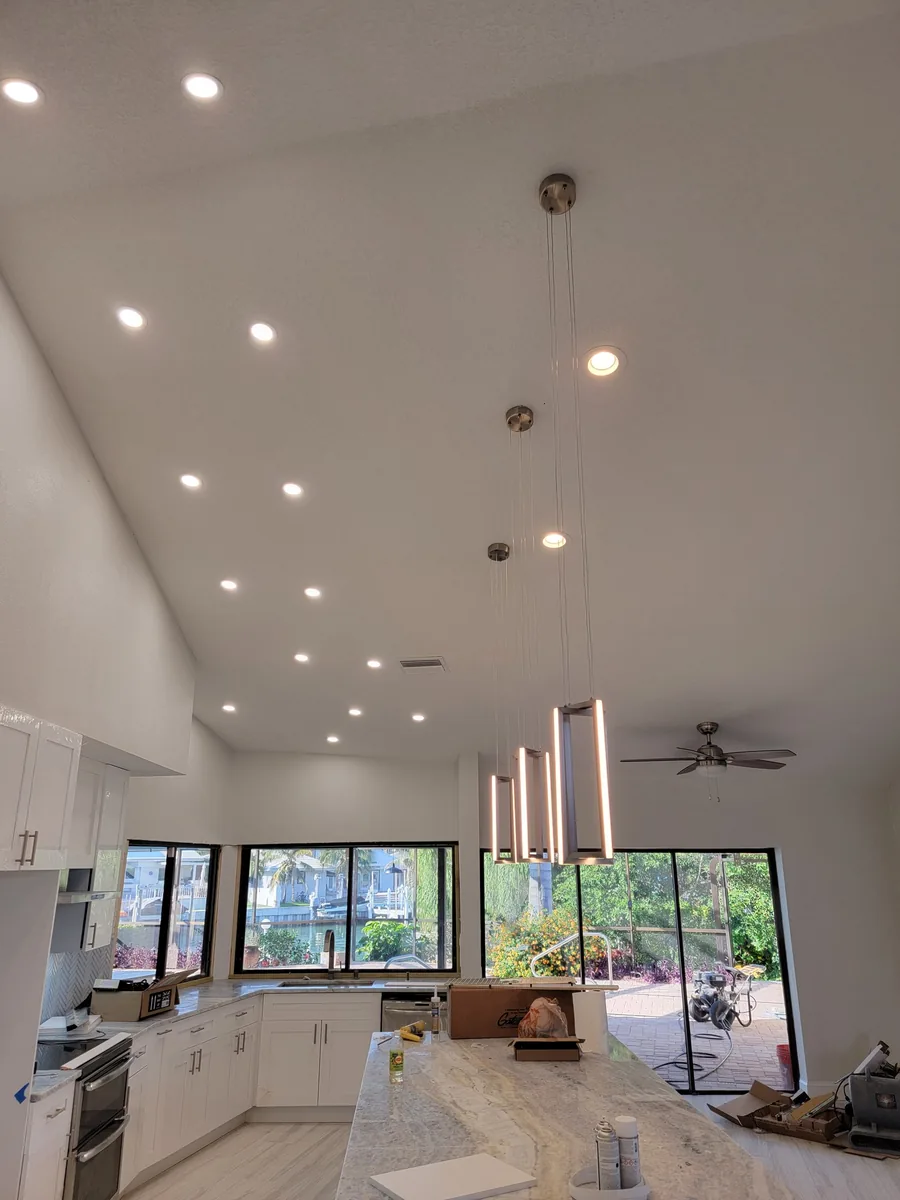 Ceiling Fan & Light Fixture Installation Vaulted kitchen with LED pendants and recessed lighting installed by Keywest Lights & Electric, St. Petersburg