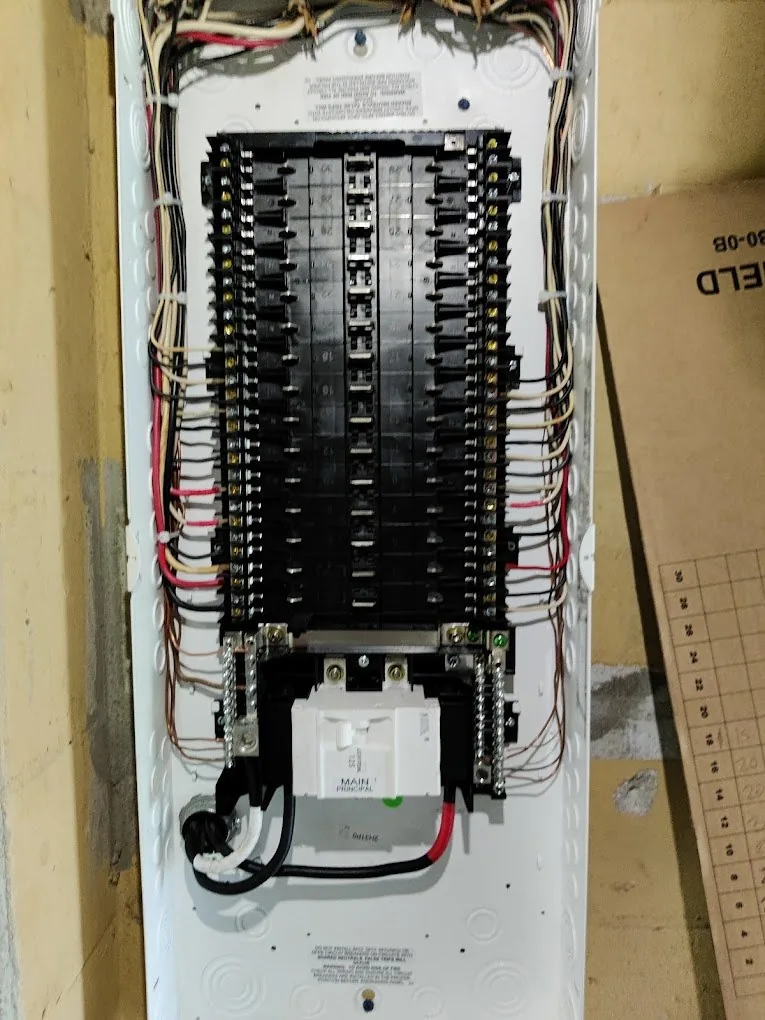 Electrical Panel Upgrades in Lealman, FL Panel replacement by Keywest Lights & Electric: new load center with main breaker wired and ready for its cover
