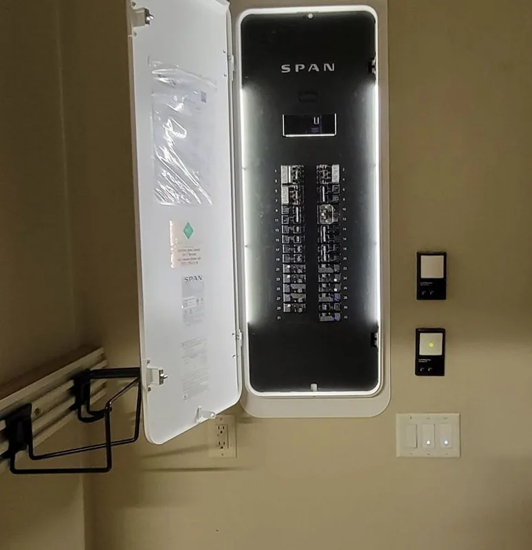 SPAN Smart Panels for Tampa Bay Hurricane Season: How to Choose Which Circuits Stay On Finished SPAN smart panel installation with the backlit door open, installed by Keywest Lights & Electric in the Tampa Bay area