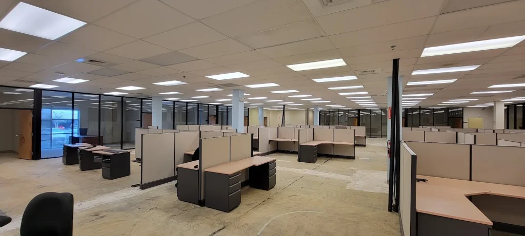Commercial LED Lighting Upgrades for Offices and Warehouses in Pinellas and Tampa Bay Open office floor with rows of LED ceiling lights on a commercial electrical job in the Tampa Bay area